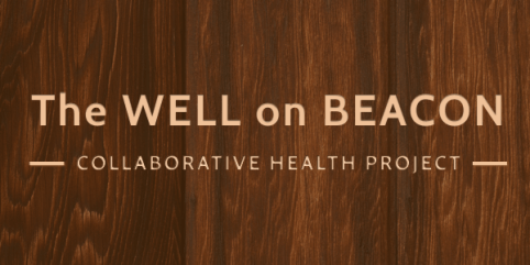 Wood grain sign for The Well on Beacon - Collaborative Health Project